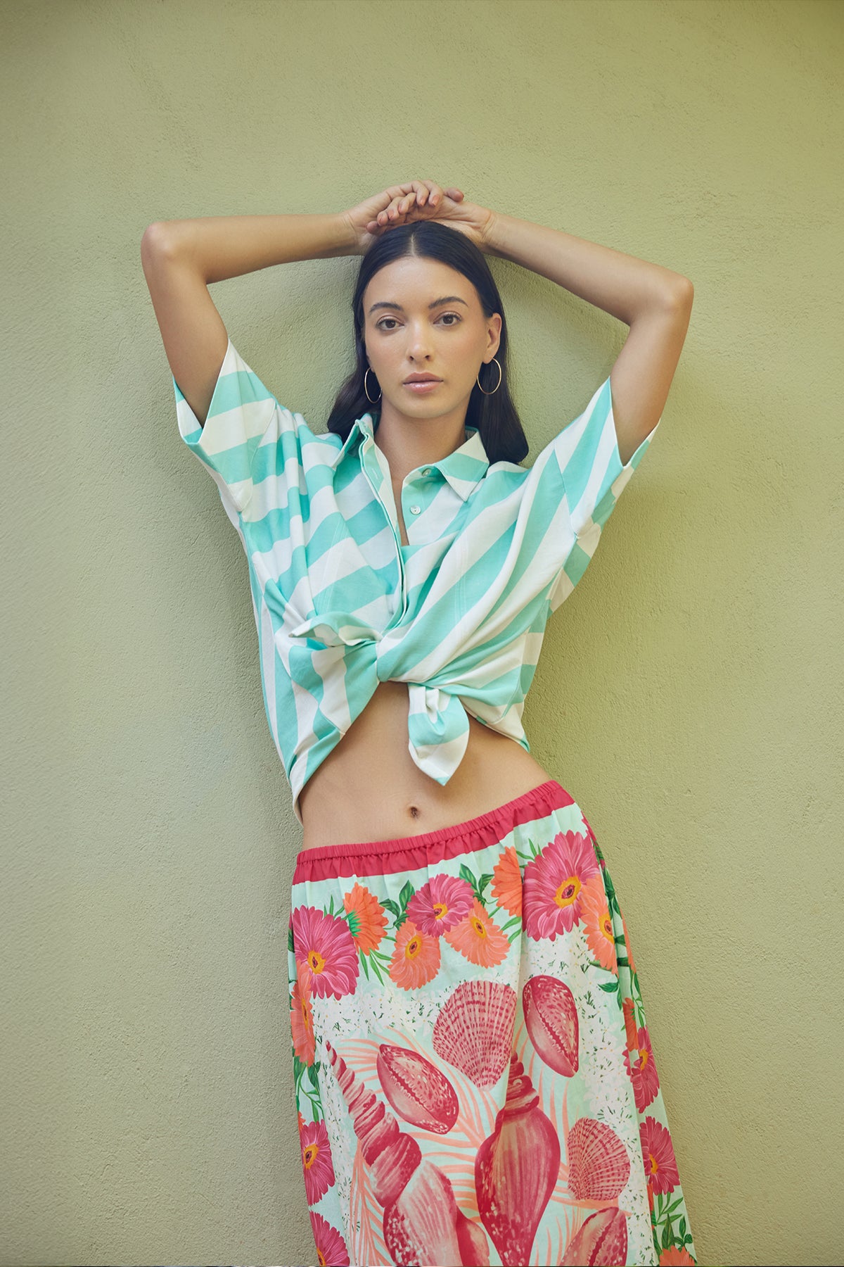 teal stripe top and red shells skirt